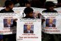 Boys hold posters with a crossed out picture of U.S. President Donald Trump during a march, denouncing plans by the Arab coalition to attack Hodeidah, from Yemen's capital Sanaa to the port city of Hodeidah April 19, 2017. REUTERS/Khaled Abdullah
