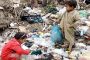 Photos shows children looking for food in a garbage due to blockade that imposed on Yemen