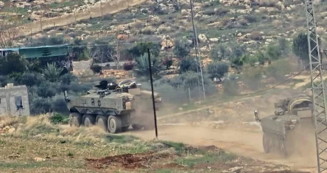 Israeli enemy continues its escalation in West Bank with raids, arrests